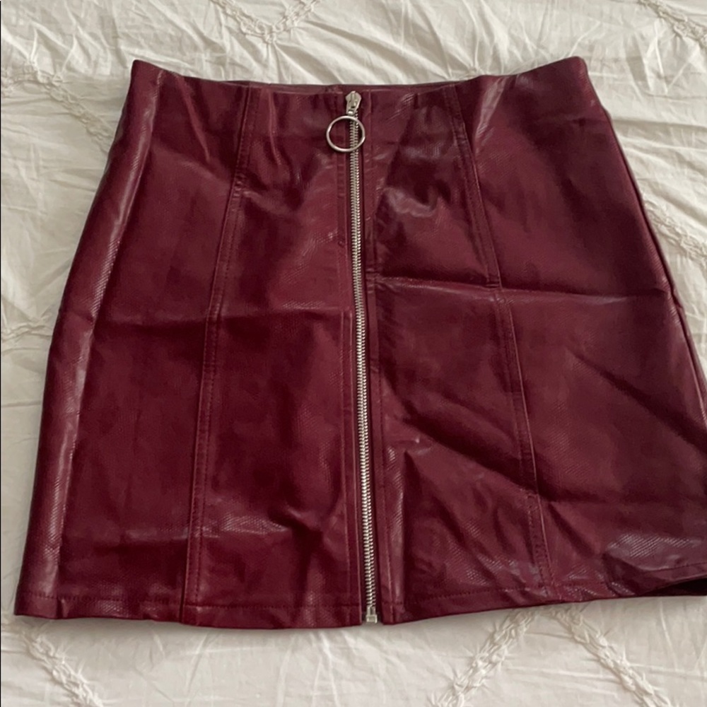 Red faux leather zip up skirt